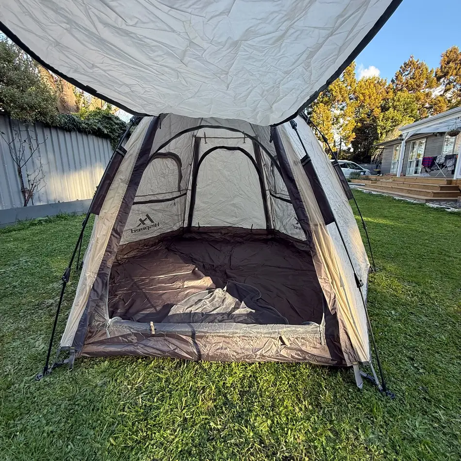 Double-Layer Hexagon Tent in Cream, set up in an Auckland backyard