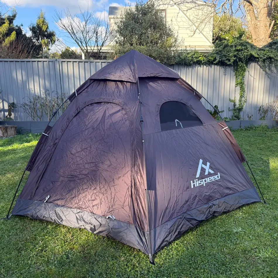 Quick-Pitch Hexagon Tent set up in an Auckland backyard