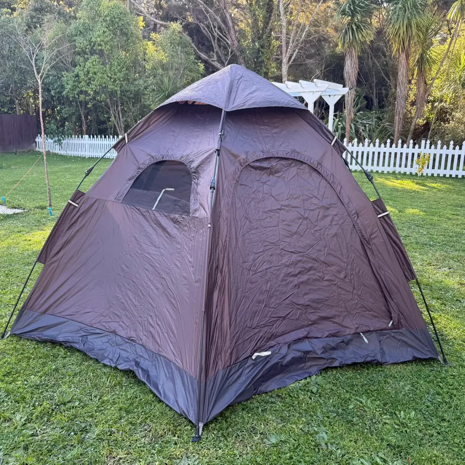 Quick-Pitch Hexagon Tent set up in an Auckland backyard