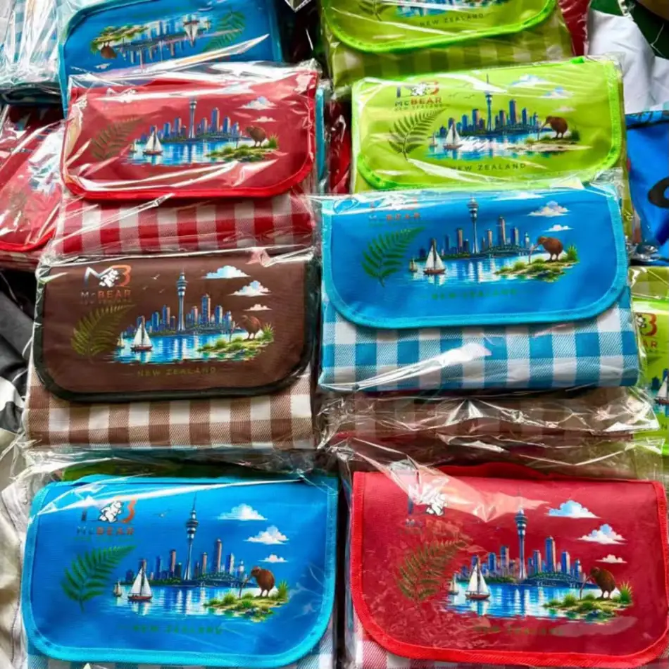 MC Bear NZ Picnic Mats packed and stacked in all four colours